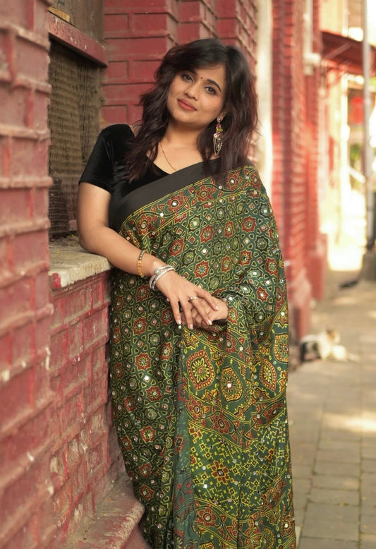 Baag Green 'Sheesha' Ajrakh Saree along with unstitched blouse.