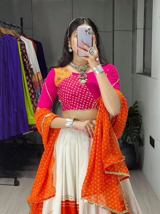 Orange & White Traditional Gamthi Work Navratri Lehenga – Real Mirror Work with Layer Patta Border